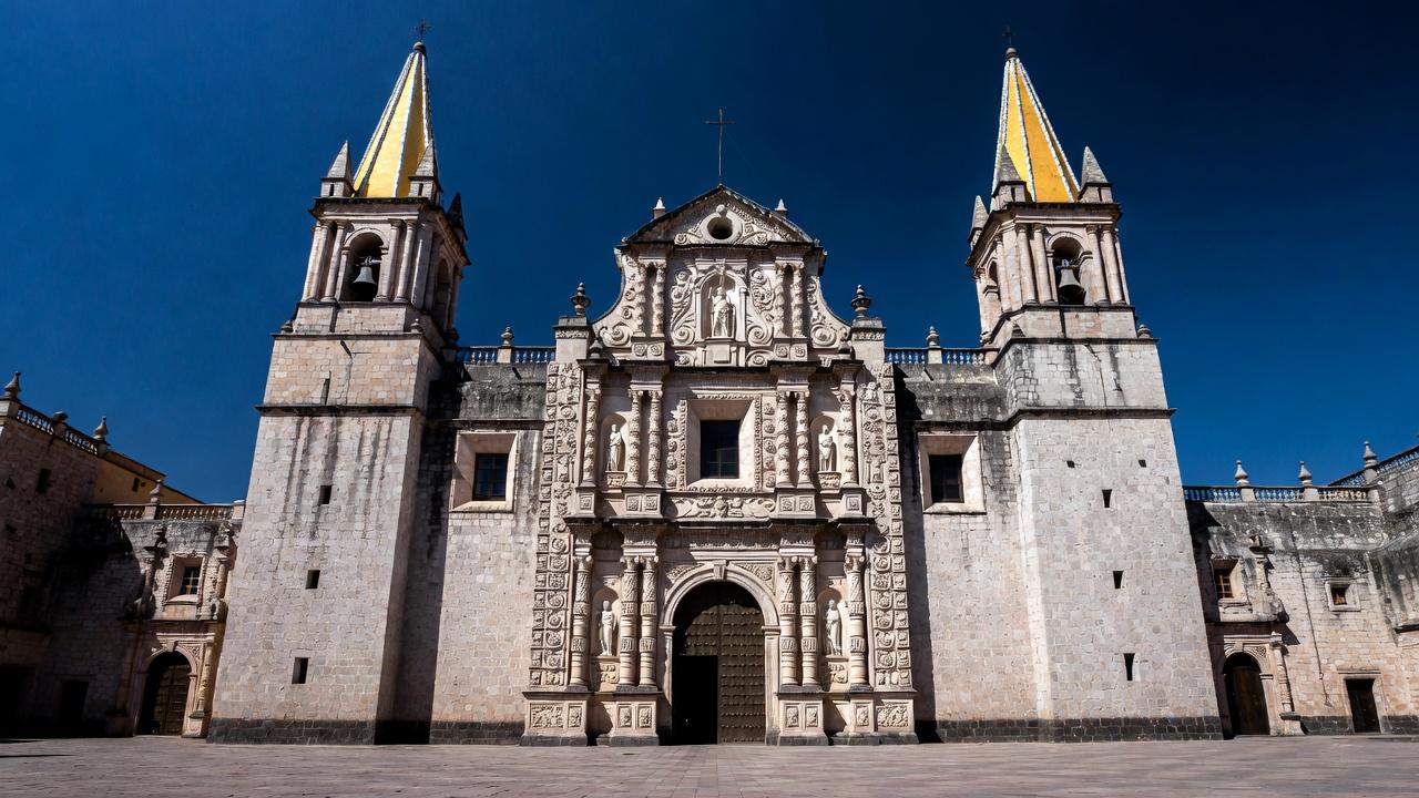 Guadalajara Cathedral twin spires against a blue sky in Centro Histórico